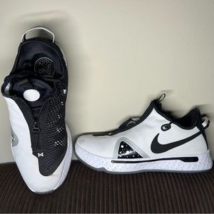 A very good condition pair of George Paul Nikes